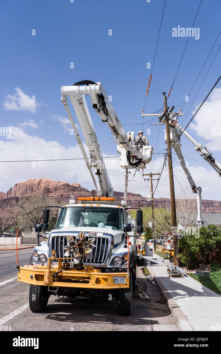 Electrical workers make perform maintenance on live electrical