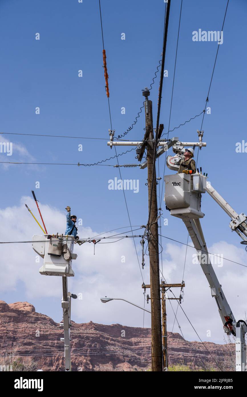 Electrical workers make perform maintenance on live electrical