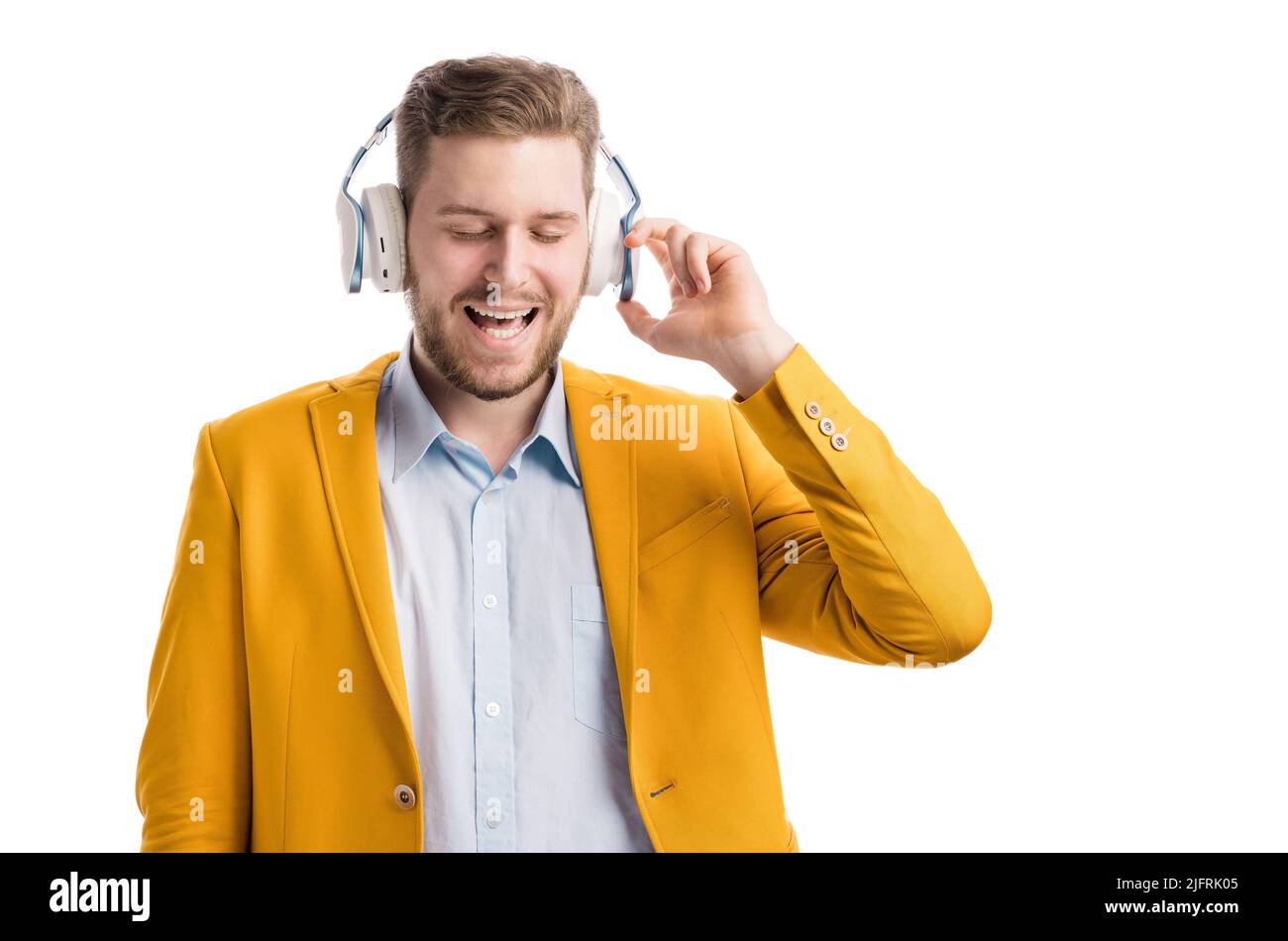 Young male with headphones in studio Stock Photo