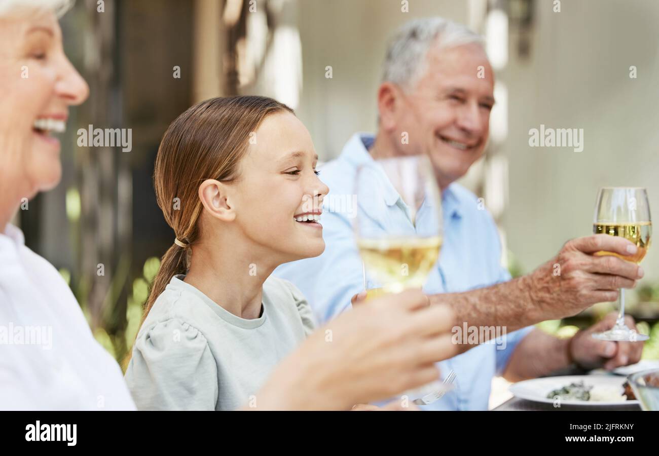 A toast to memories. Shot of a family sharing a toast