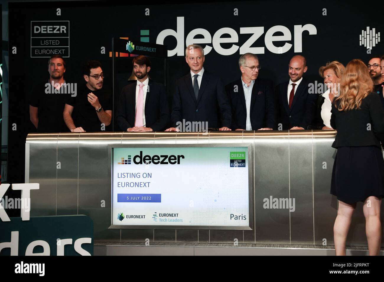 Paris, France, July 5, 2022. Deezer CEO Jeronimo Folgueira, French Economy and Finance Minister Bruno Le Maire, French Junior minister for Digital Transition and Telecommunications Jean-Noel Barrot and President of WarnerMedia France Iris Knobloch at the Deezer's listing ring the ball ceremony on the Pan-European stock exchange Euronext at Euronext headquarters in La Defense business district near Paris, France on July 5, 2022. Photo by Christophe Michel/ABACAPRESS.COM Stock Photo