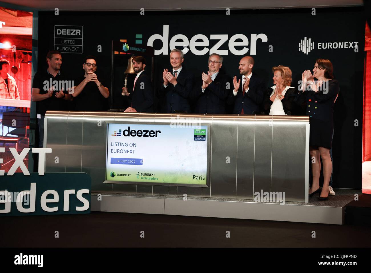 Paris, France, July 5, 2022. Deezer CEO Jeronimo Folgueira, French Economy and Finance Minister Bruno Le Maire, French Junior minister for Digital Transition and Telecommunications Jean-Noel Barrot and President of WarnerMedia France Iris Knobloch at the Deezer's listing ring the ball ceremony on the Pan-European stock exchange Euronext at Euronext headquarters in La Defense business district near Paris, France on July 5, 2022. Photo by Christophe Michel/ABACAPRESS.COM Stock Photo