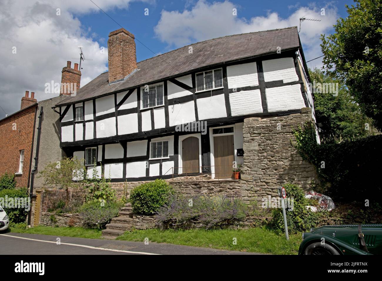 Church House a ;listed half timbered black and white house which was fomerly the Old School in Pembridge Arrow Valley mediaeval village Herefordhire U Stock Photo