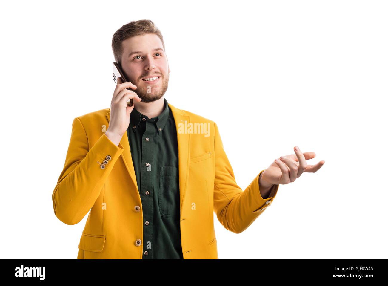 Smiling businessman speaking on smartphone Stock Photo