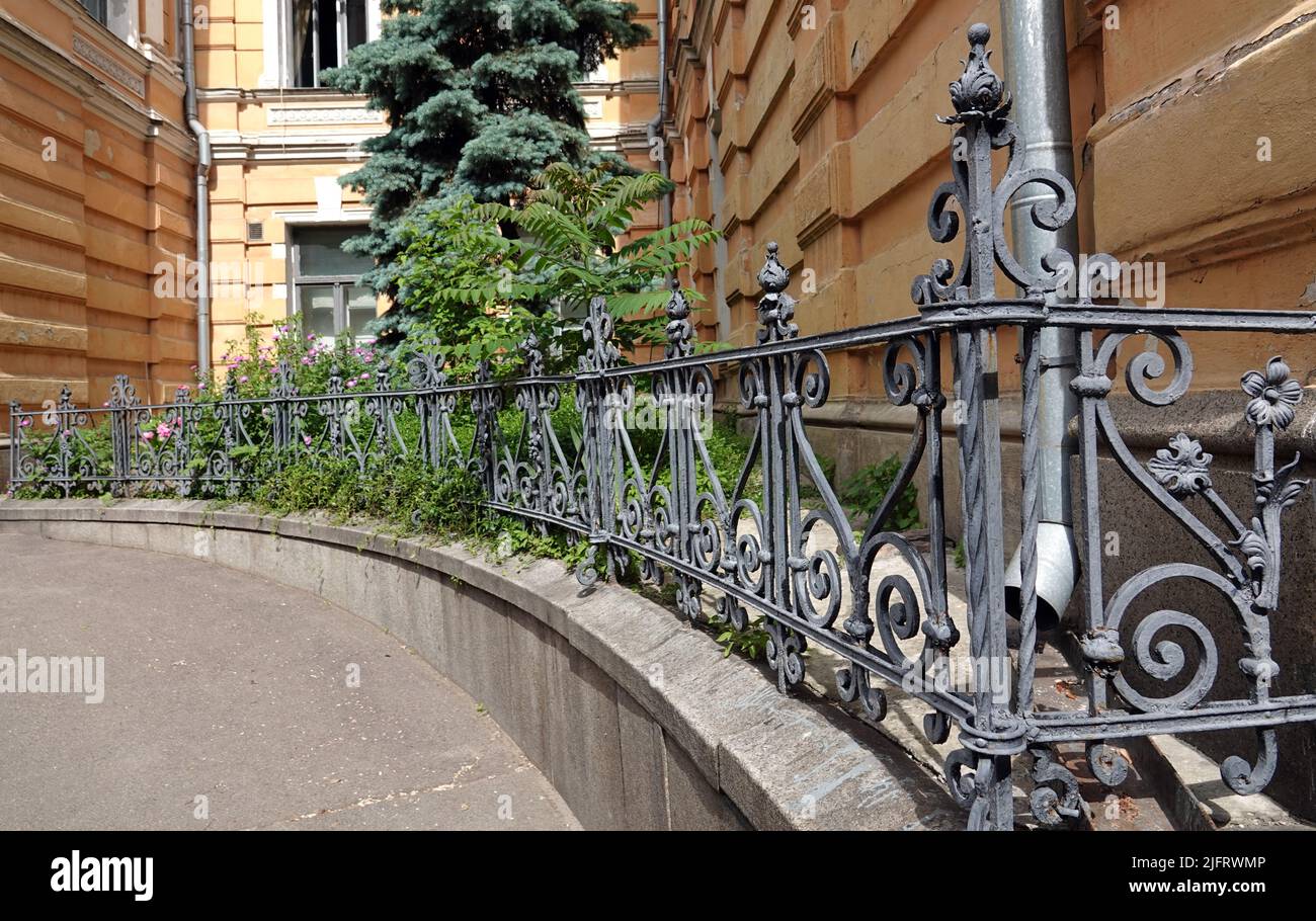 Kiev, Ukraine July 10, 2021 Fence of an old house with artistic