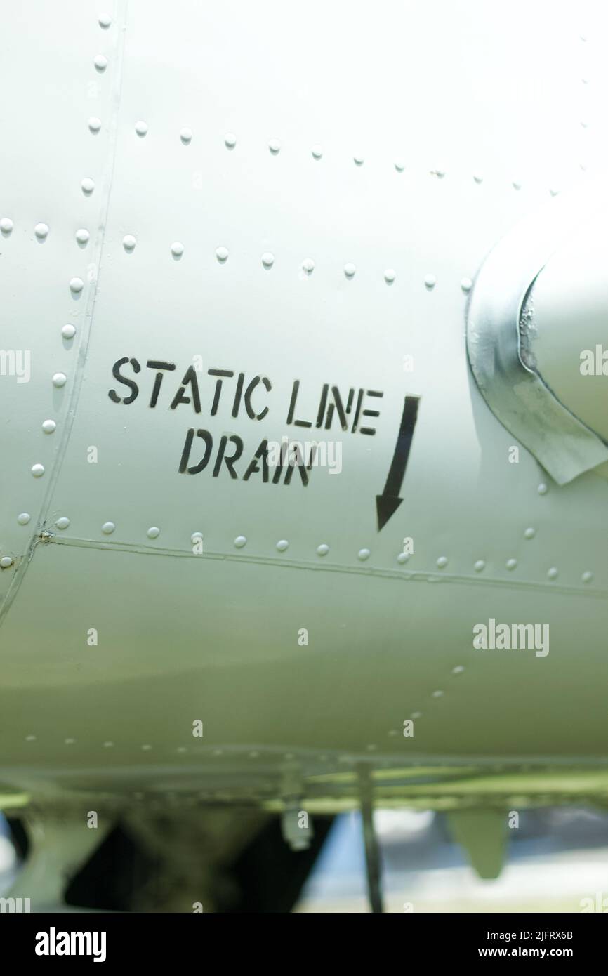 Static line drain decal on an old aircraft Stock Photo