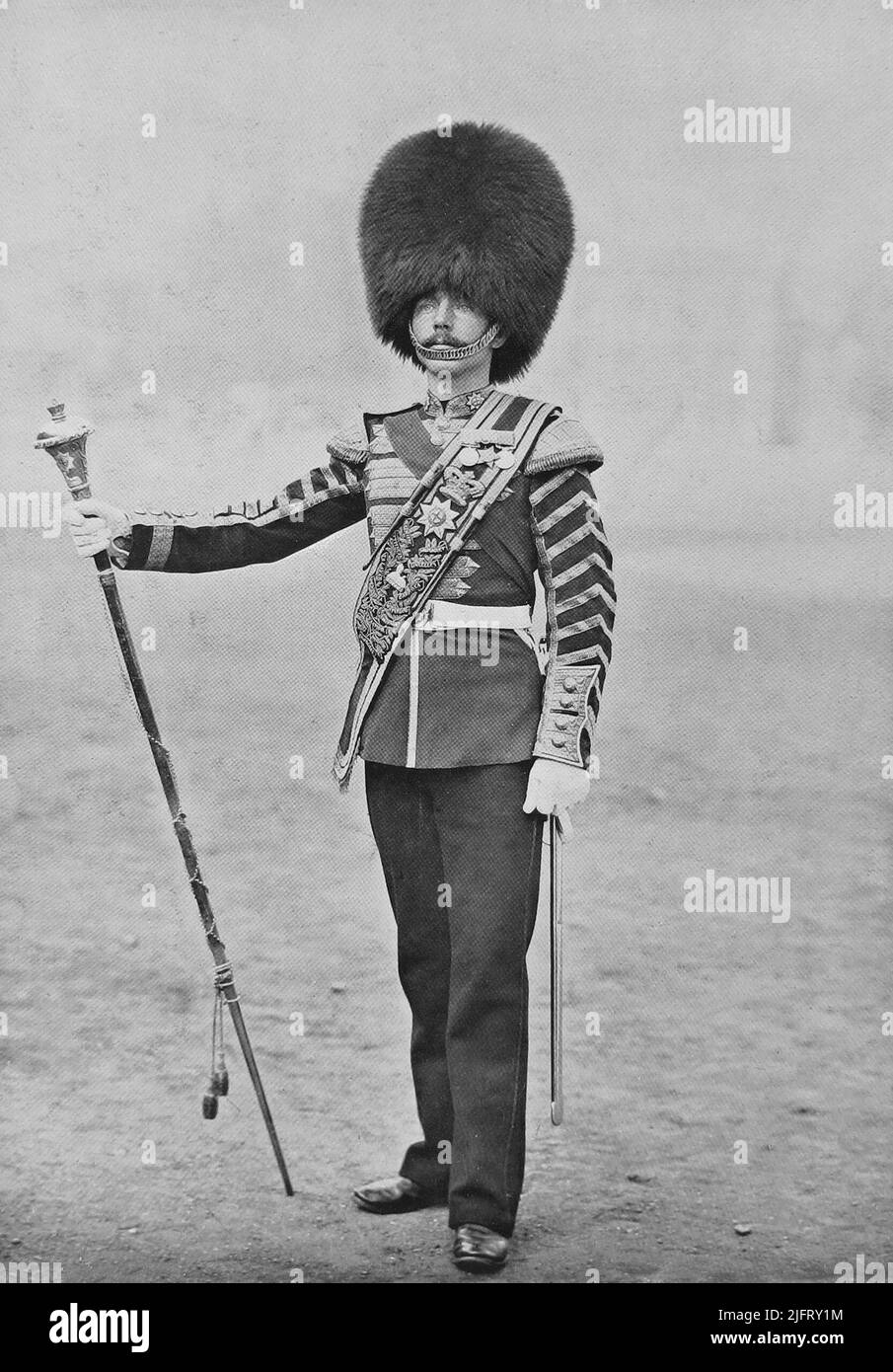 1895. Drum-Major Patrick of the 2nd Battalion Coldstream Guards. He enlisted in 1875, at the age of fourteen, and served with the battalion in the Egyptian Campaign of 1882, for which he wears the medal and star. His father served in the 2nd Coldstream Guards, and three of his uncles fell in action while with the battalion in the Russian War. He is an East Anglian, from Great Yarmouth, and has the good conduct medal. Stock Photo
