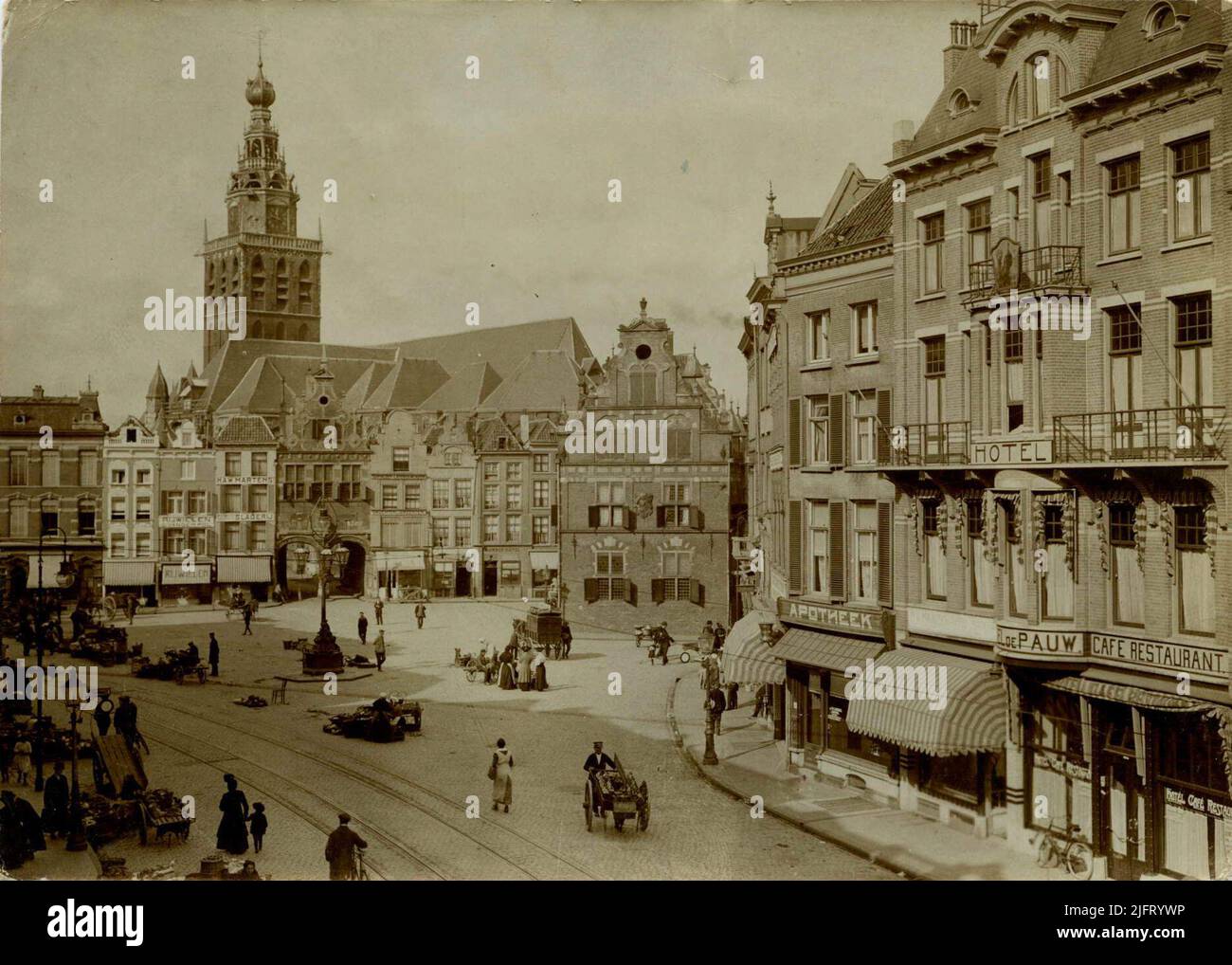 Image of the 'Great Market', first decade. West wall of the market with the  Kerkboog and the St. Stevenskerk and Tower. Right, the north side, the  eastern side wall of the Waaggebouw