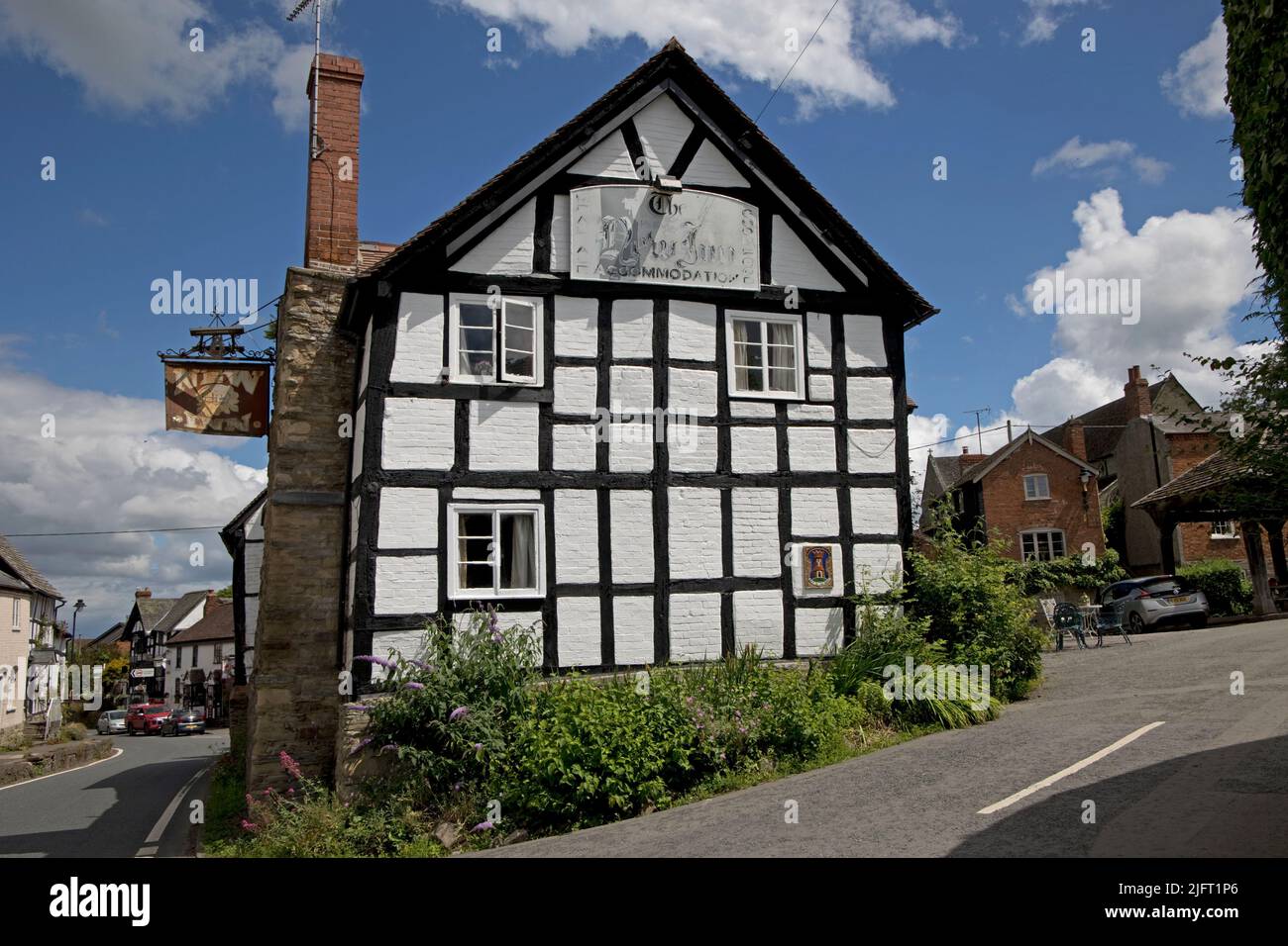 The New Inn is a listed medieaval half-timbered old coaching inn which is now a Public House in Pembridge Herefordshire UK Stock Photo