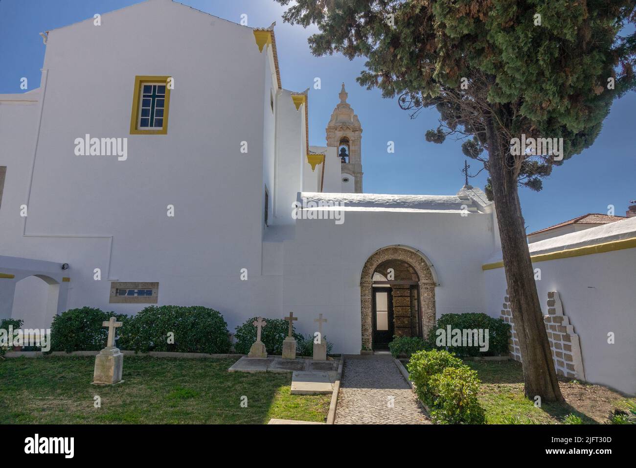 Igreja do Carmo Church Faro Portugal Entrance To The Bone Chapel Called The Capela dos Ossos Rear Facade And Garden Faro The Algarve Portugal Stock Photo