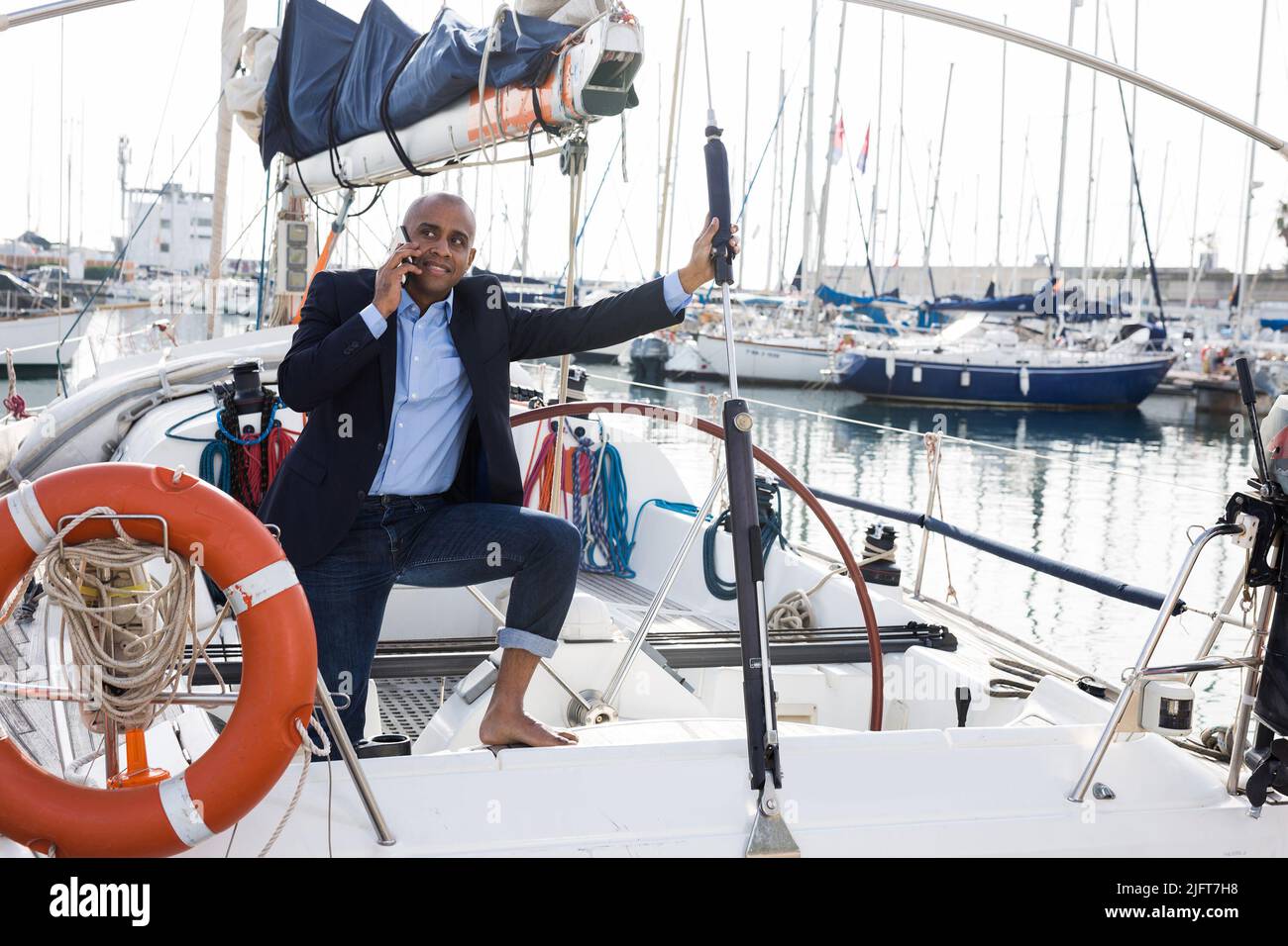 Man yacht suit hi-res stock photography and images - Alamy