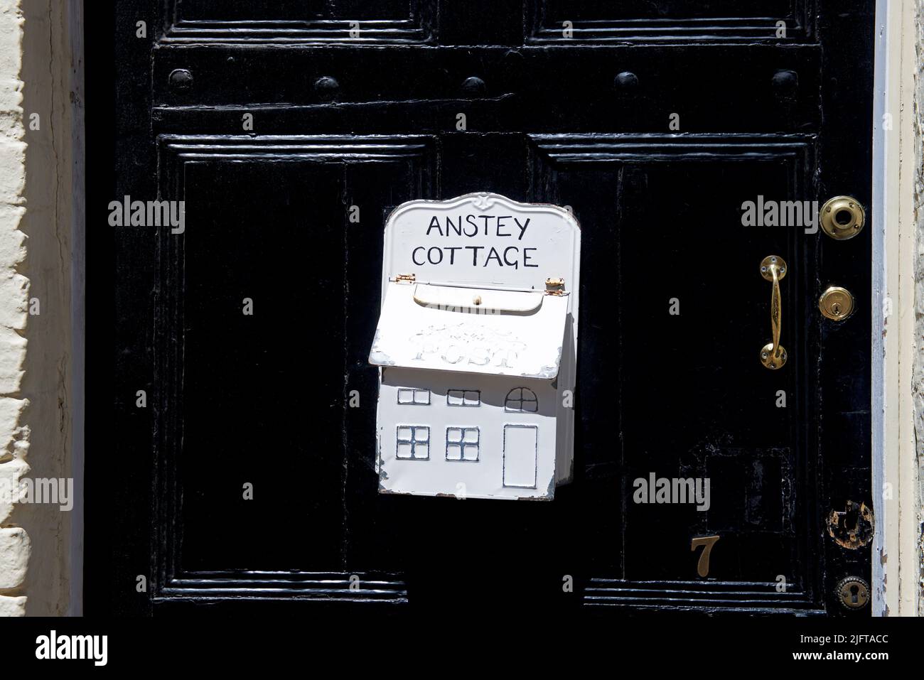 Elaborate letterbox in the shape of a house, England UK Stock Photo Alamy