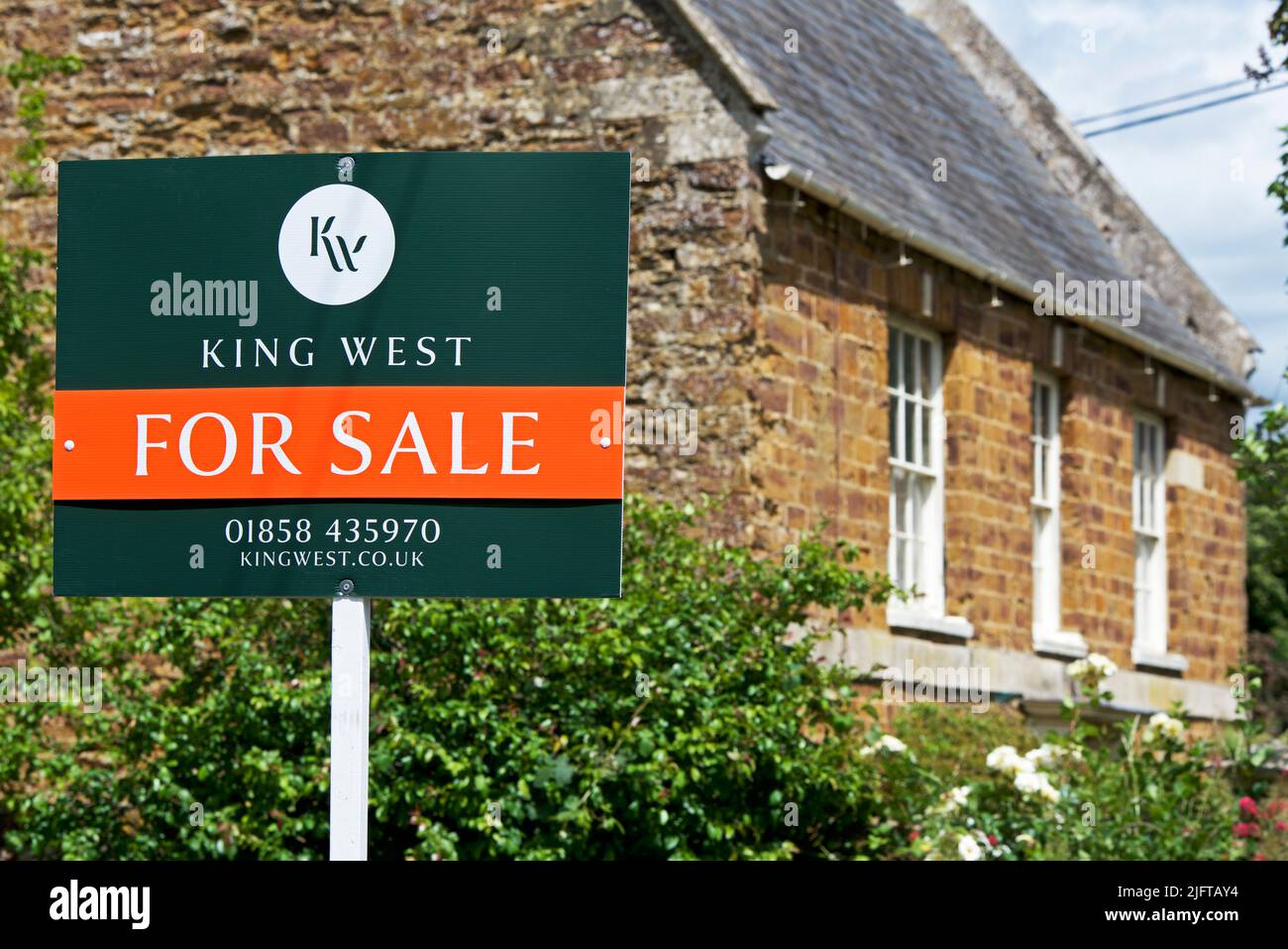 House for sale sign in the village of Weston by Welland, Northampton