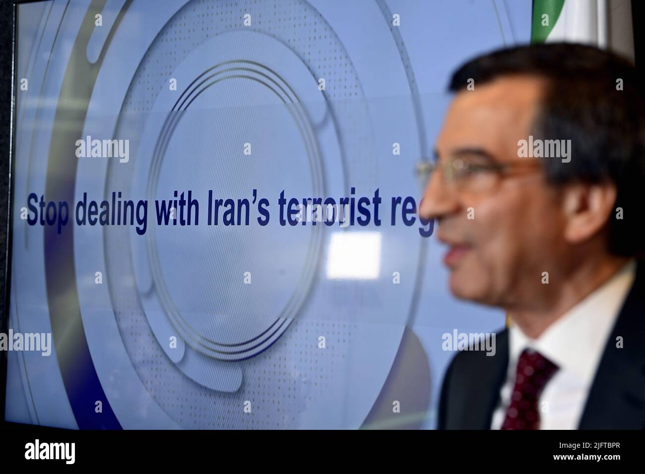 Farzin Hashemi, Deputy chairman of the foreign affairs committee of national council of resistance of Iran pictured during a press moment by the National Council of Resistance of Iran (NCRI) in protest against the treaty between the Belgian government and the Iranian regime, in Brussels, Tuesday 05 July 2022. In recent days there has been discussion about a bill that would allow Belgium to exchange prisoners with Iran. The proposal will be discussed in the parliament today. BELGA PHOTO ERIC LALMAND Stock Photo