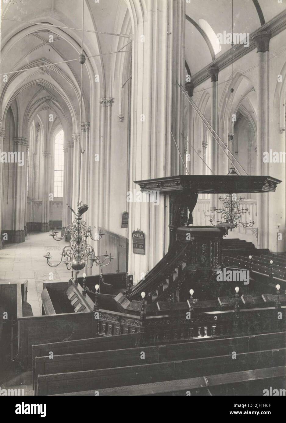 The Northern Choir Gang in the St. Stevenskerk, seen to the east from the Noorderdwarspand; On the right the pulpit (made in 1640 by Joost Jacobs) with around the pulpit still the original baptismal fencing (made in 1652 by Cornelis Hermansz. Schaeff) in its original place Stock Photo