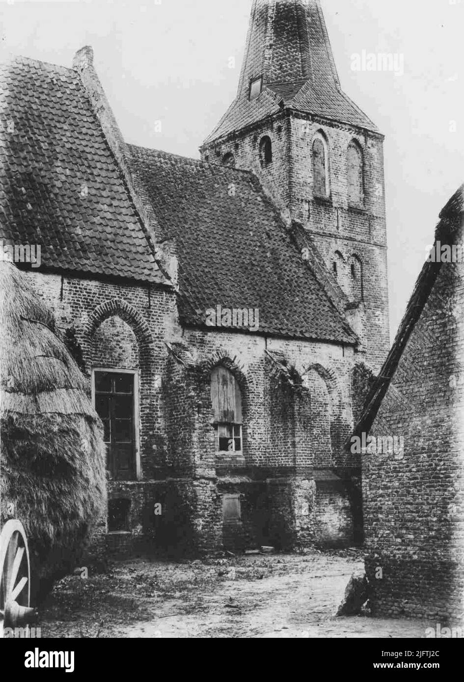 Church in Persingen seen from adjacent farm Stock Photo