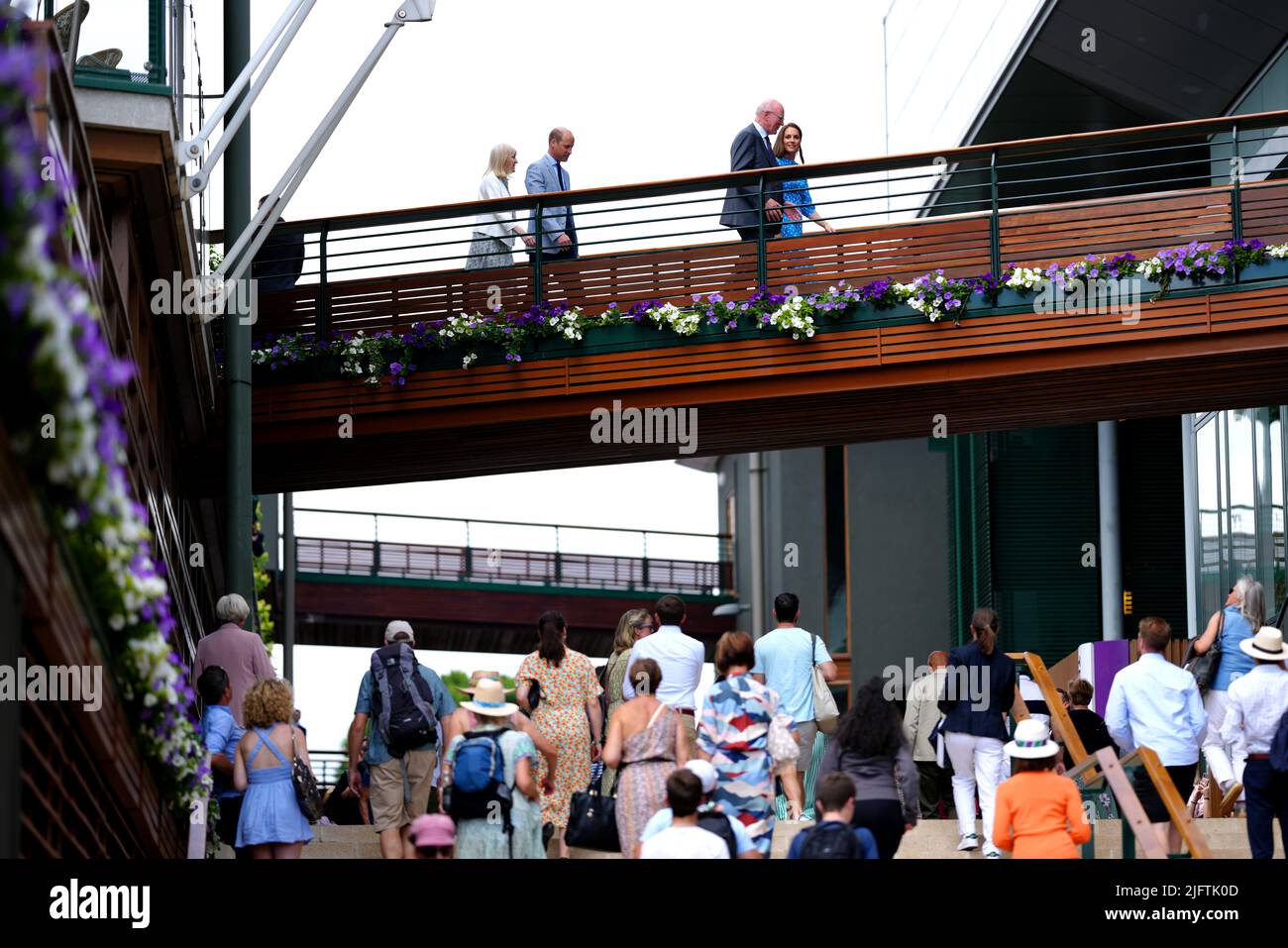 The Duke and Duchess of Cambridge cross the bridge as they make their