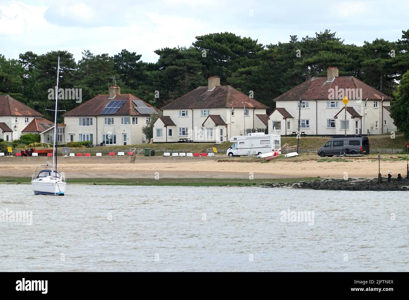 Bawdsey Quay, Suffolk, UK - 5 July 2022: Houses at Bawdsey Quay. Stock Photo