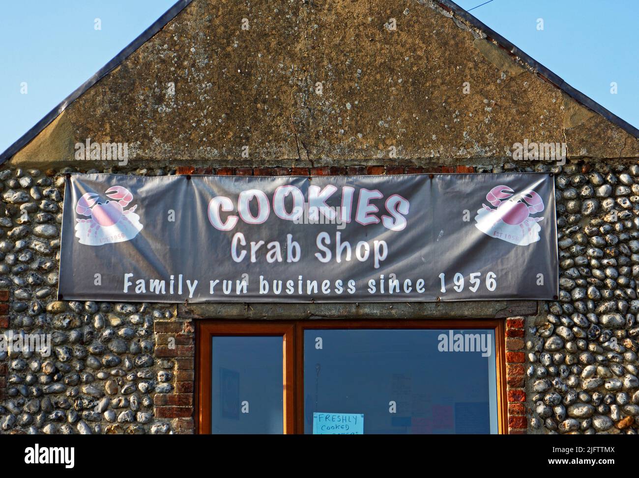 A sign for Cookies Crab Shop by the A149 coast road in North Norfolk at Salthouse, Norfolk, England, United Kingdom. Stock Photo