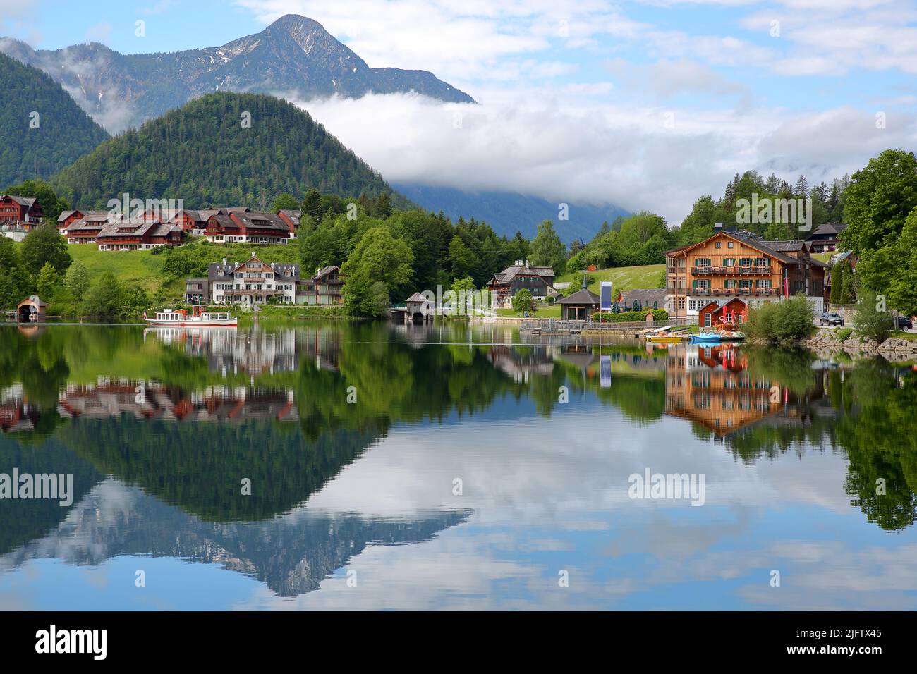 Reflections on Grundlsee lake (Eastern part) and colorful scenery, Salzkammergut, Styria, Austria, Europe Stock Photo