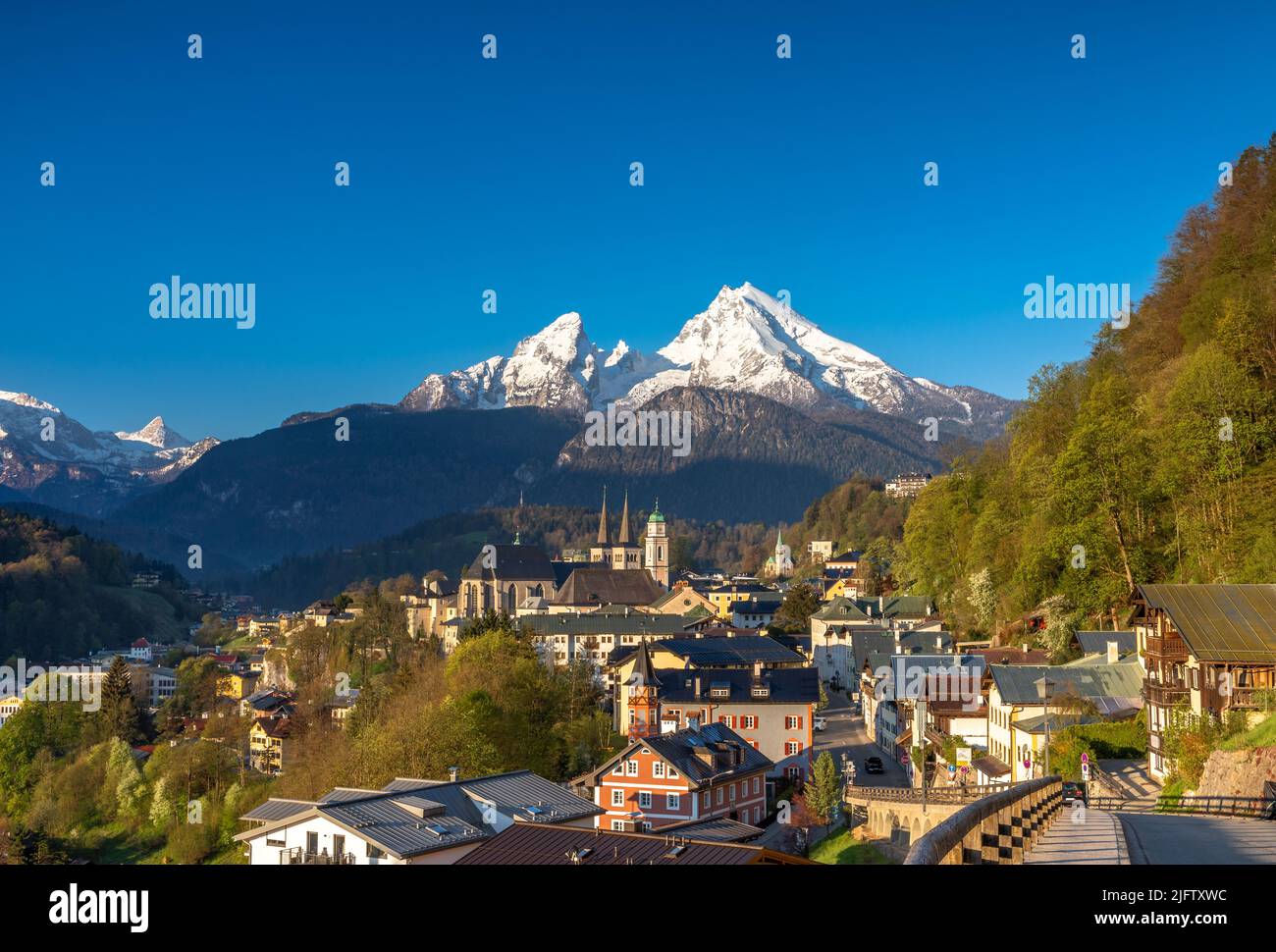 View over Berchtesgaden in front of Watzmann mountain in morning light, Bavaria, Germany Stock Photo
