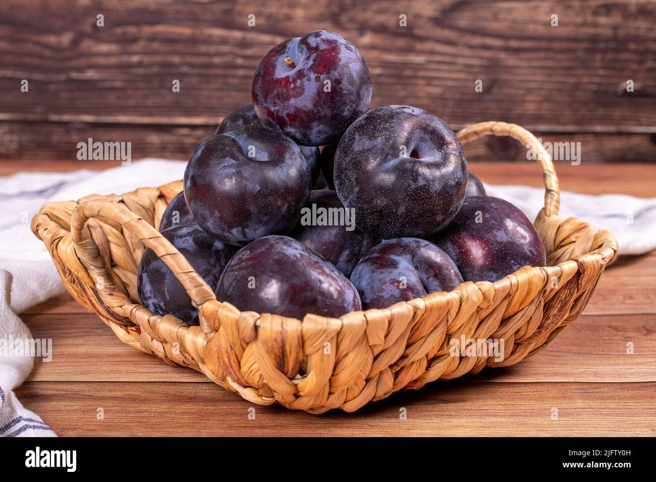 Black Grates from a Home Fruit and Vegetable Dryer with Dried Plums on a  Wooden Background with Fresh Plums. Home Preparation of Stock Photo - Image  of cooking, diet: 194226558