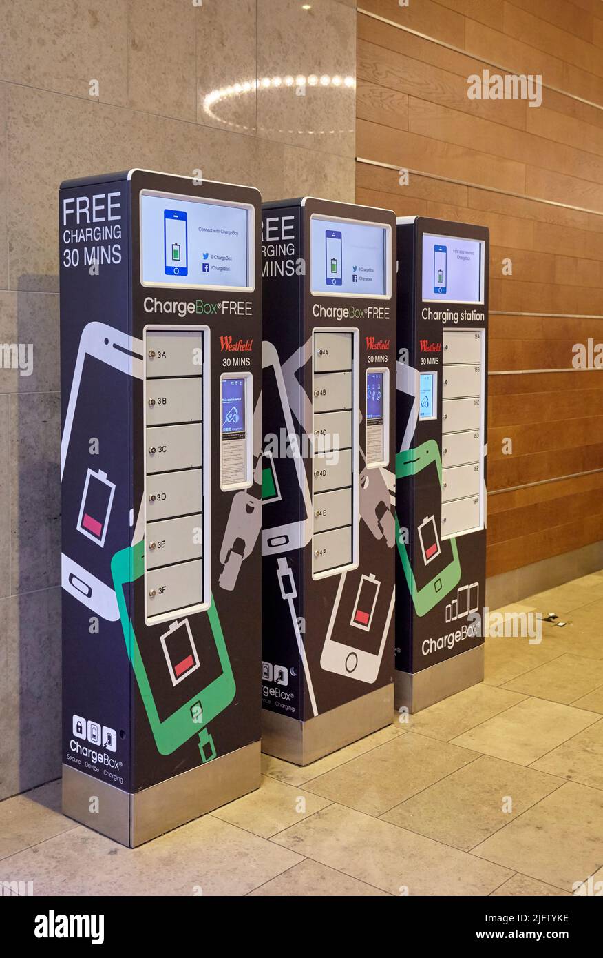 Free Phone charging points in Westfield shopping centre, Stratford,  London Stock Photo