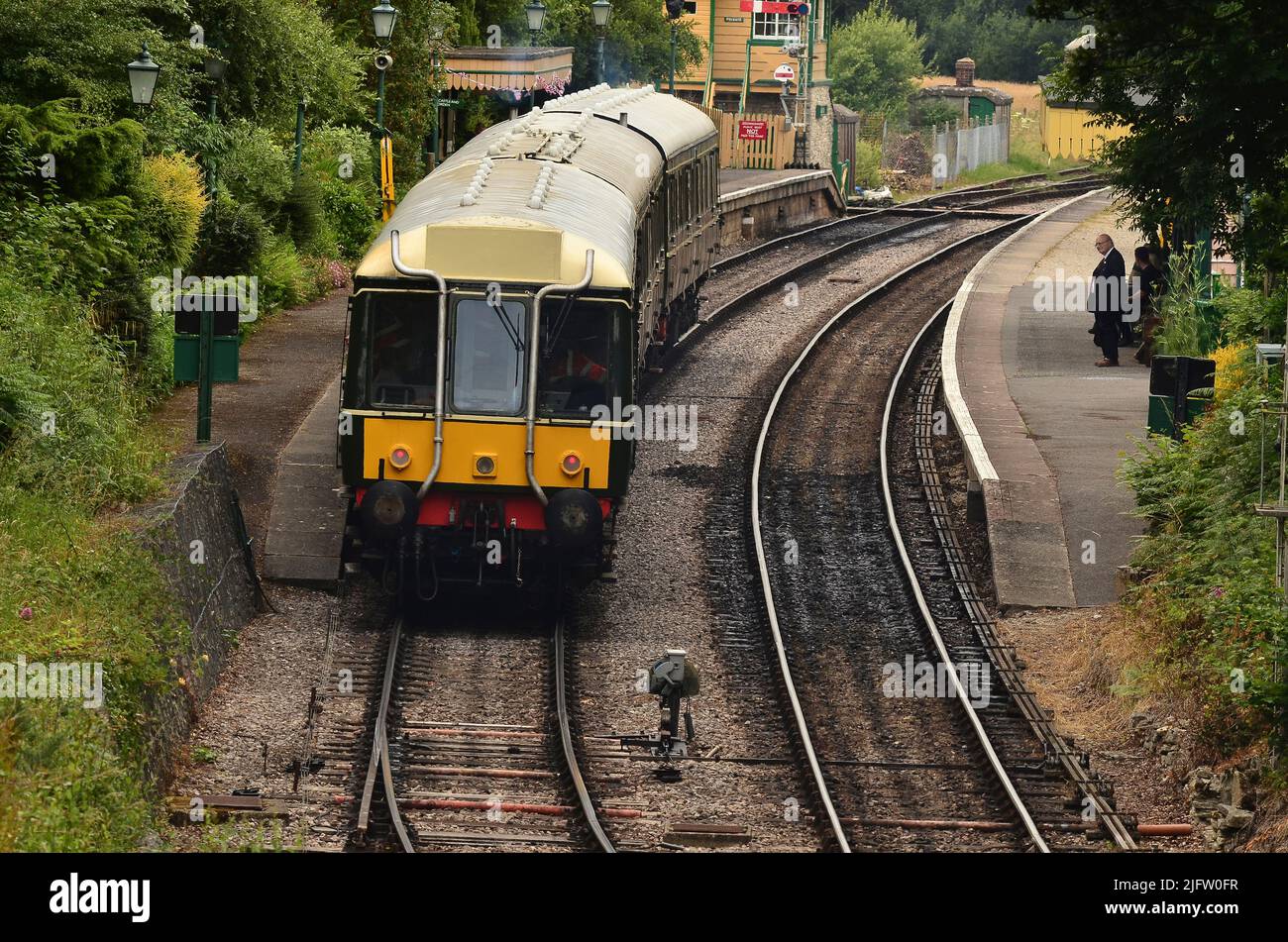 Diesel passenger train in Harman's Cross station on the Swanage steam railway, Dorset, UK Stock Photo