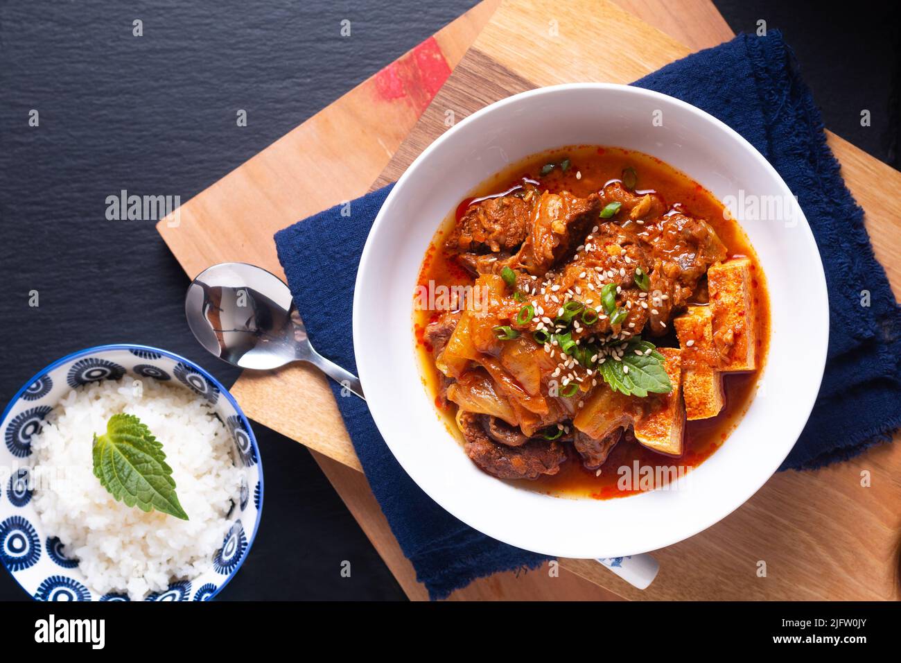 Asian food concept homemade Kimchi Beef Stew Kimchi Jjigae on wooden