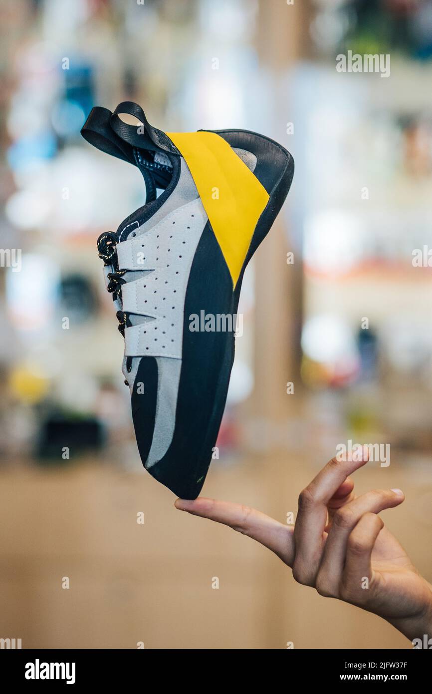 Close up detail product photo of climbing shoes. Shoes for rock climbing and sport climbing, big wall and mountaineering. Stock Photo