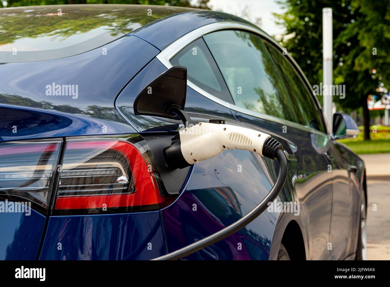 Picture of Electric car at the charging station. Ecology. Eco-friendly transport ...