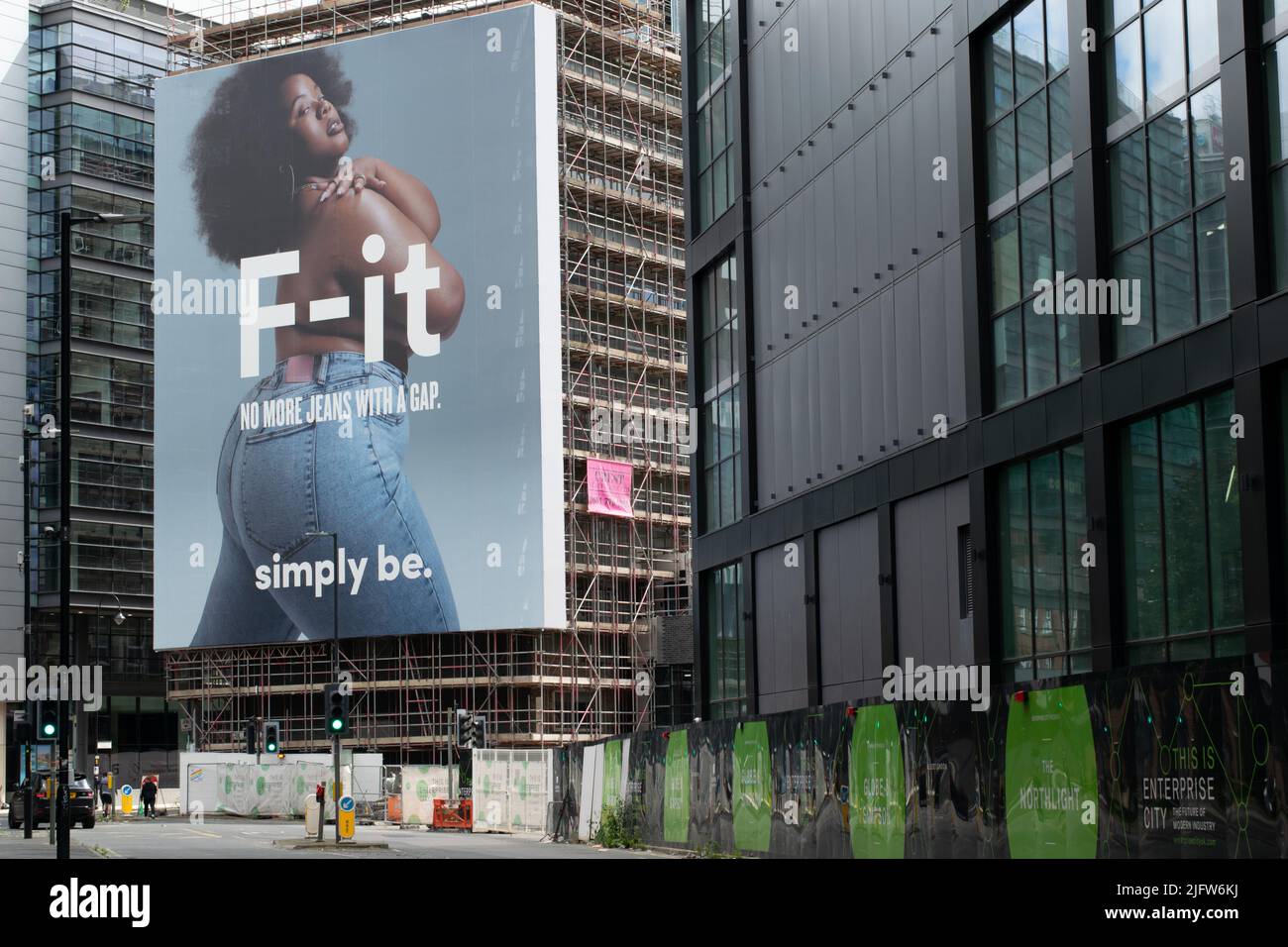 Advert for F-it jeans Simply Be on construction site of The Factory. Manchester UK Stock Photo