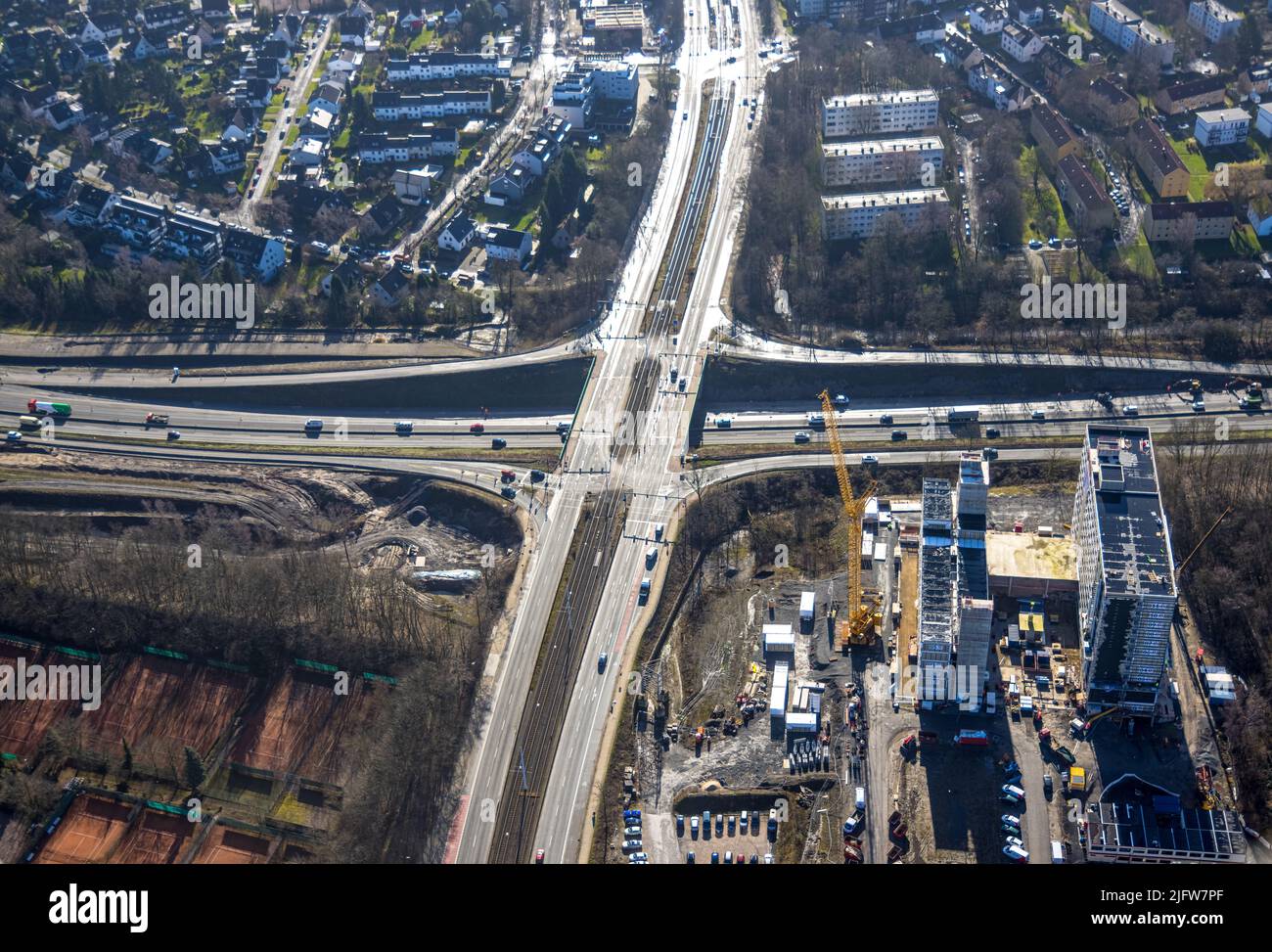 Aerial view, intersection of Universitätsstraße and motorway A448 as well as construction site and new construction of a building complex in modular c Stock Photo