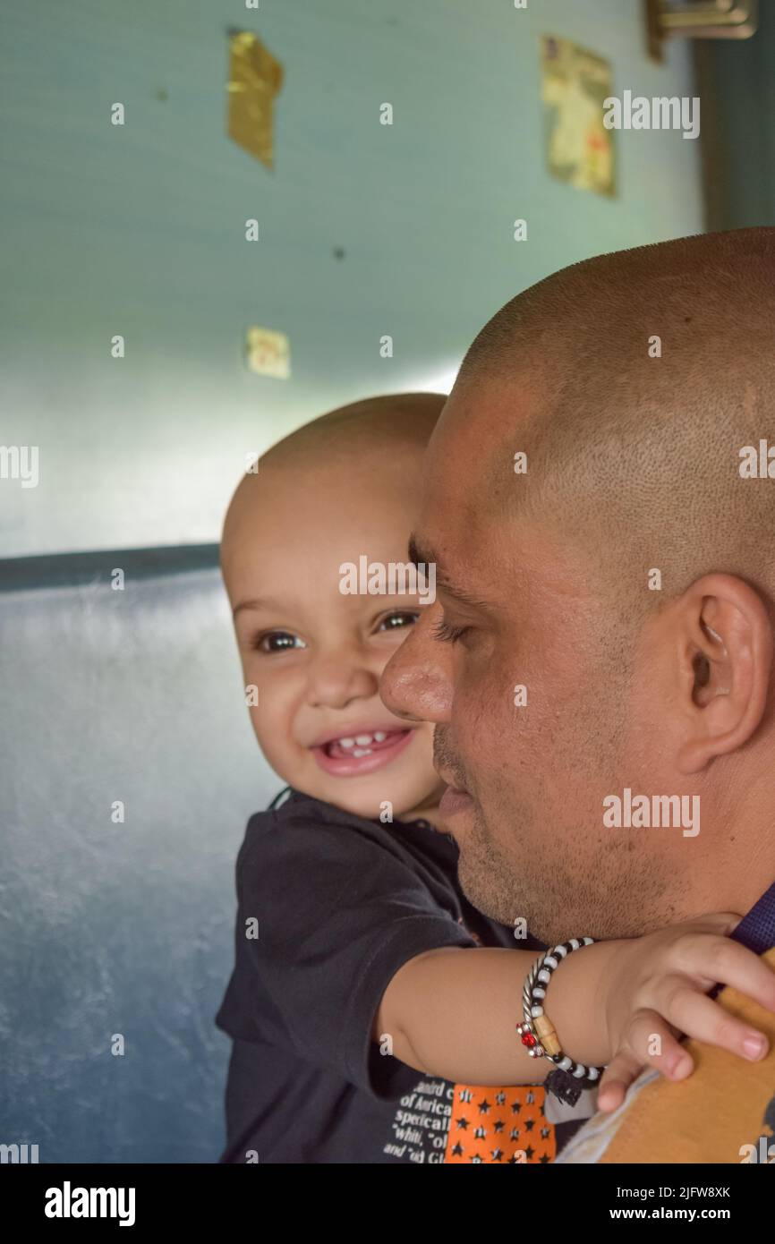 Father and son enjoying together and smiling Stock Photo