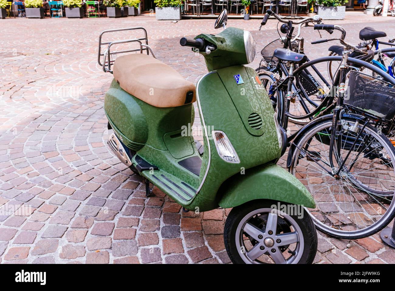 Customized Vespa scooter parked on the street. Bergamo, Lombardy, Italy, Europe Stock Photo