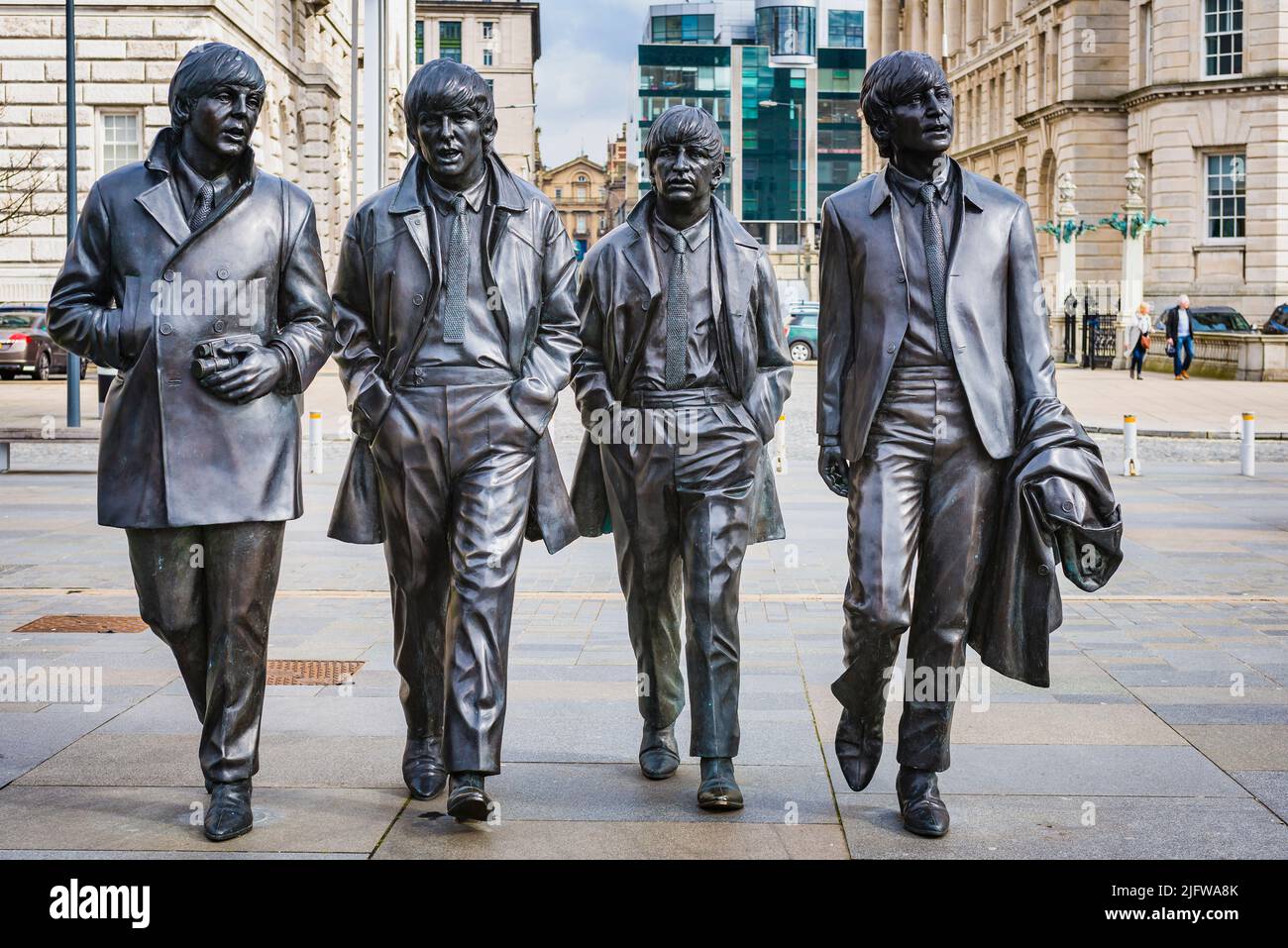 The Beatles statue in their home city Liverpool, at Pier Head on Liverpool waterfront. Leverpool, Merseyside, Lancashire, England, United Kingdom Stock Photo