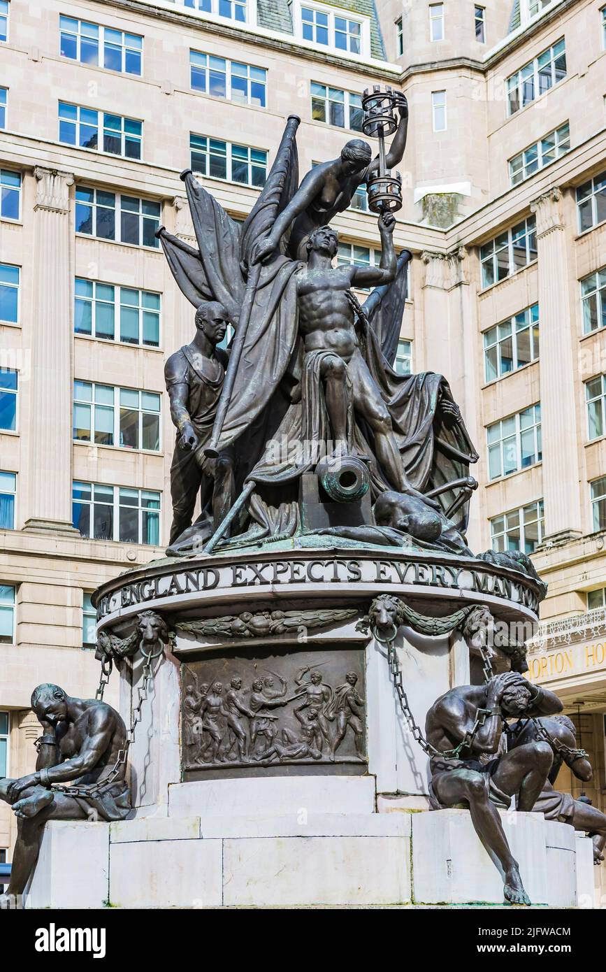 The Nelson Monument is a monument to Admiral Horatio Nelson, in Exchange Flags, Liverpool, England. It was designed by Matthew Cotes Wyatt and sculpte Stock Photo