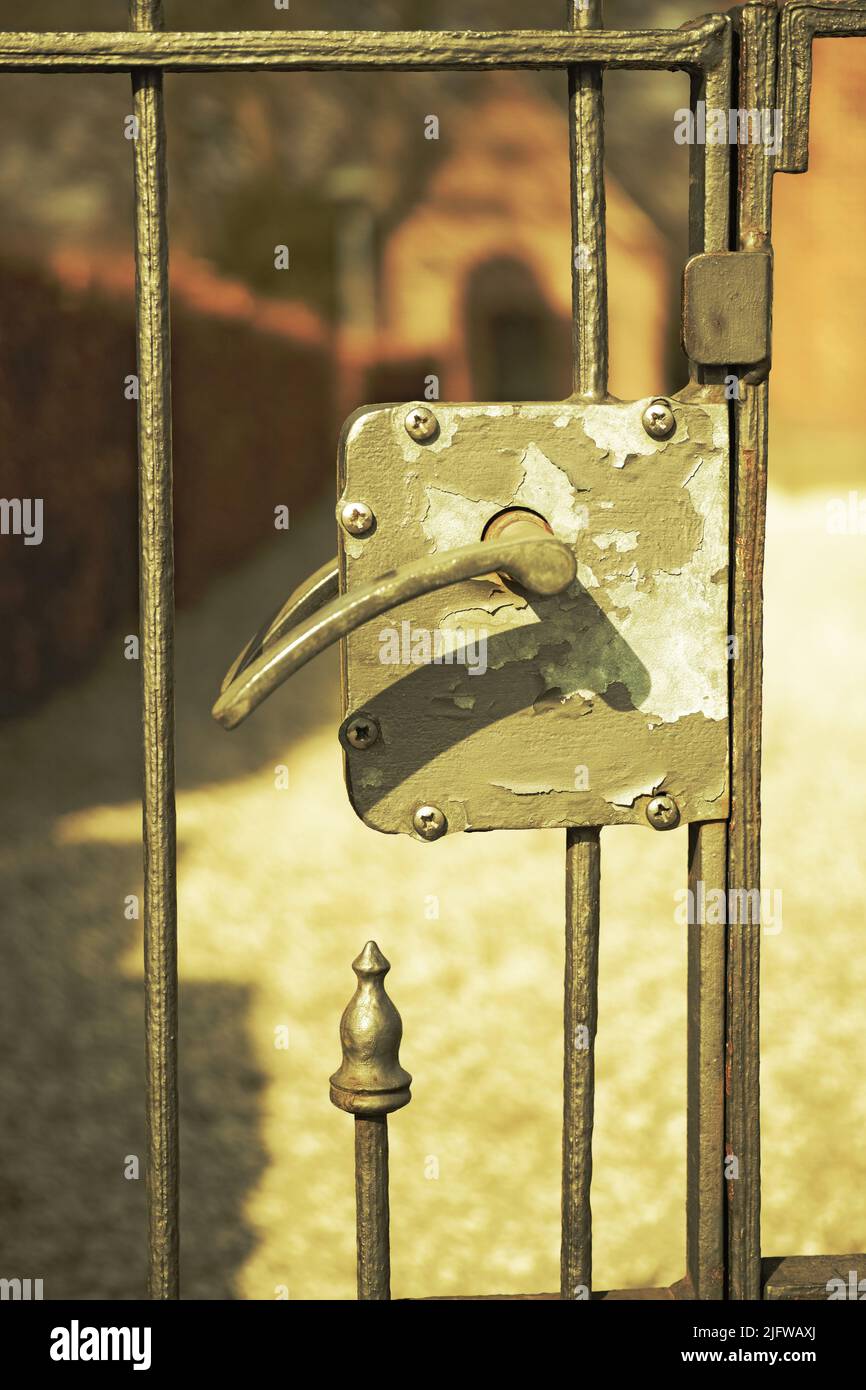 Wrought Iron Gate With Latch Near Brick Wall Stock Photo Image Of Metal