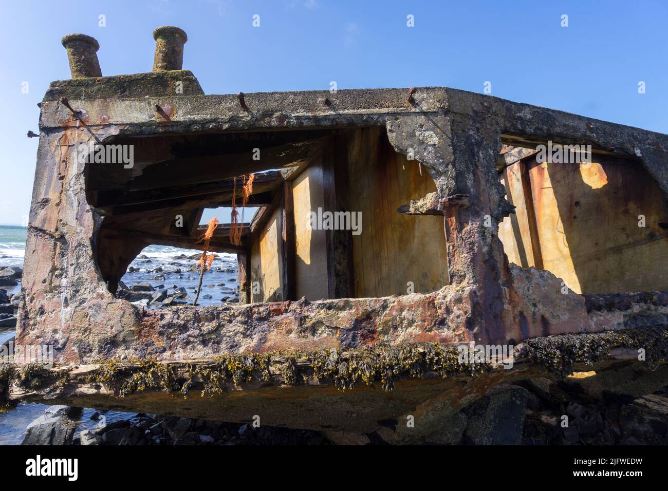 Remains of Mulberry Harbours at Garlieston Bay where they were tested in 1943 Stock Photo