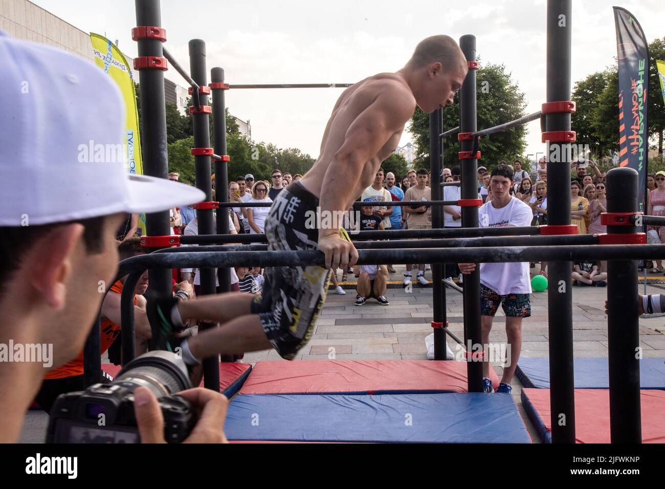 Moscow, Russia. 26th of June, 2022 Young people do exercises during a