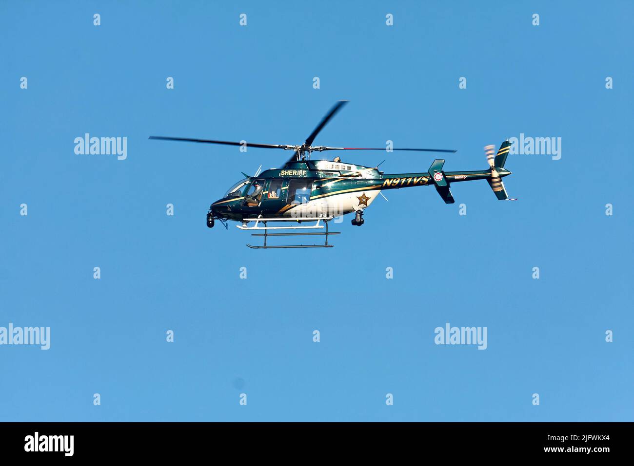 sheriff helicopter, police; rotarywing aircraft, flying, motion