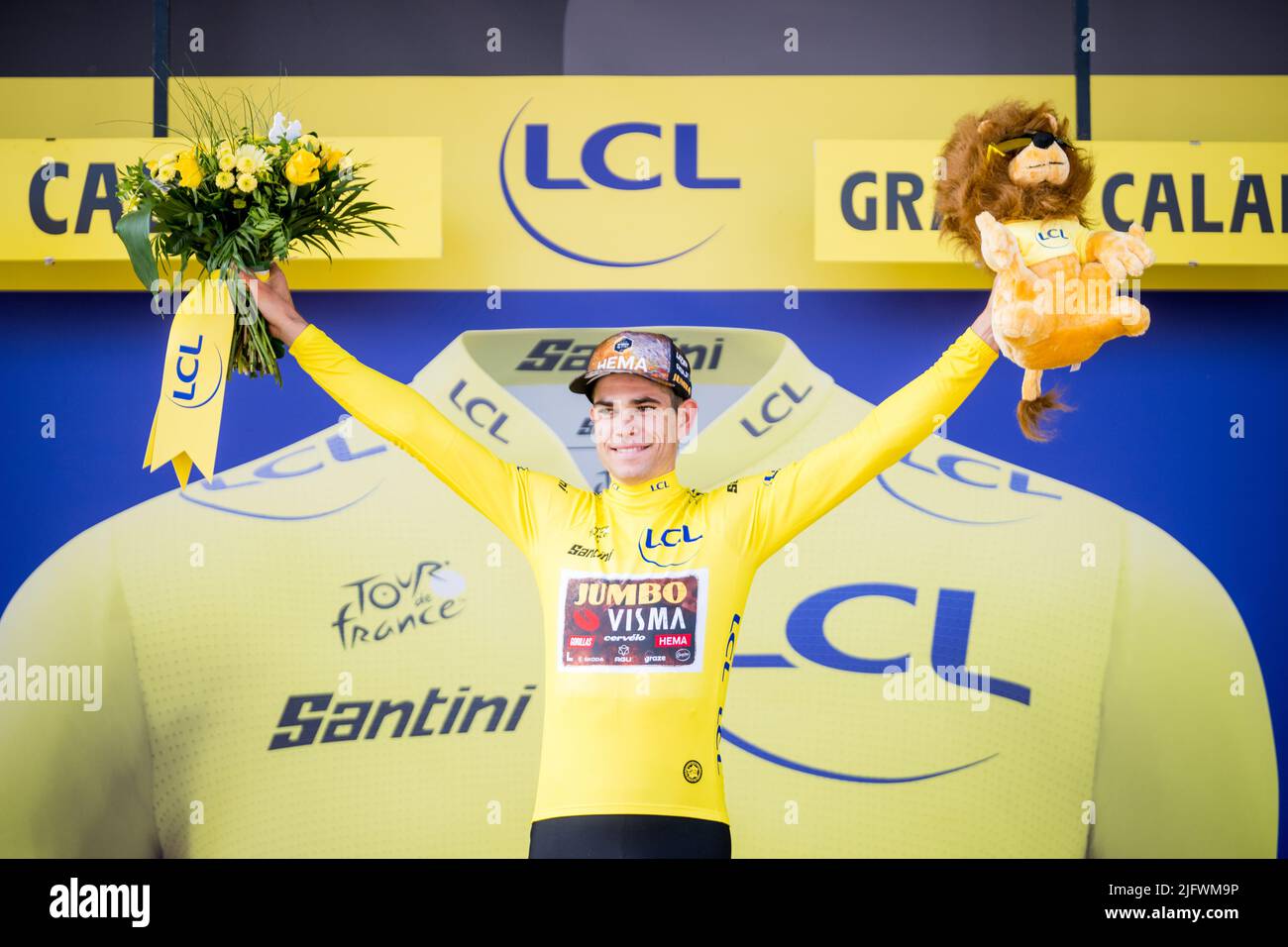 Calais, France,05 July 2022. Belgian Wout Van Aert of Team Jumbo-Visma wearing the yellow jersey pictured at the podium of stage four of the Tour de France cycling race, a 171.5 km race from Dunkerque to Calais, France on Tuesday 05 July 2022. This year's Tour de France takes place from 01 to 24 July 2022. BELGA PHOTO JASPER JACOBS - UK OUT Stock Photo
