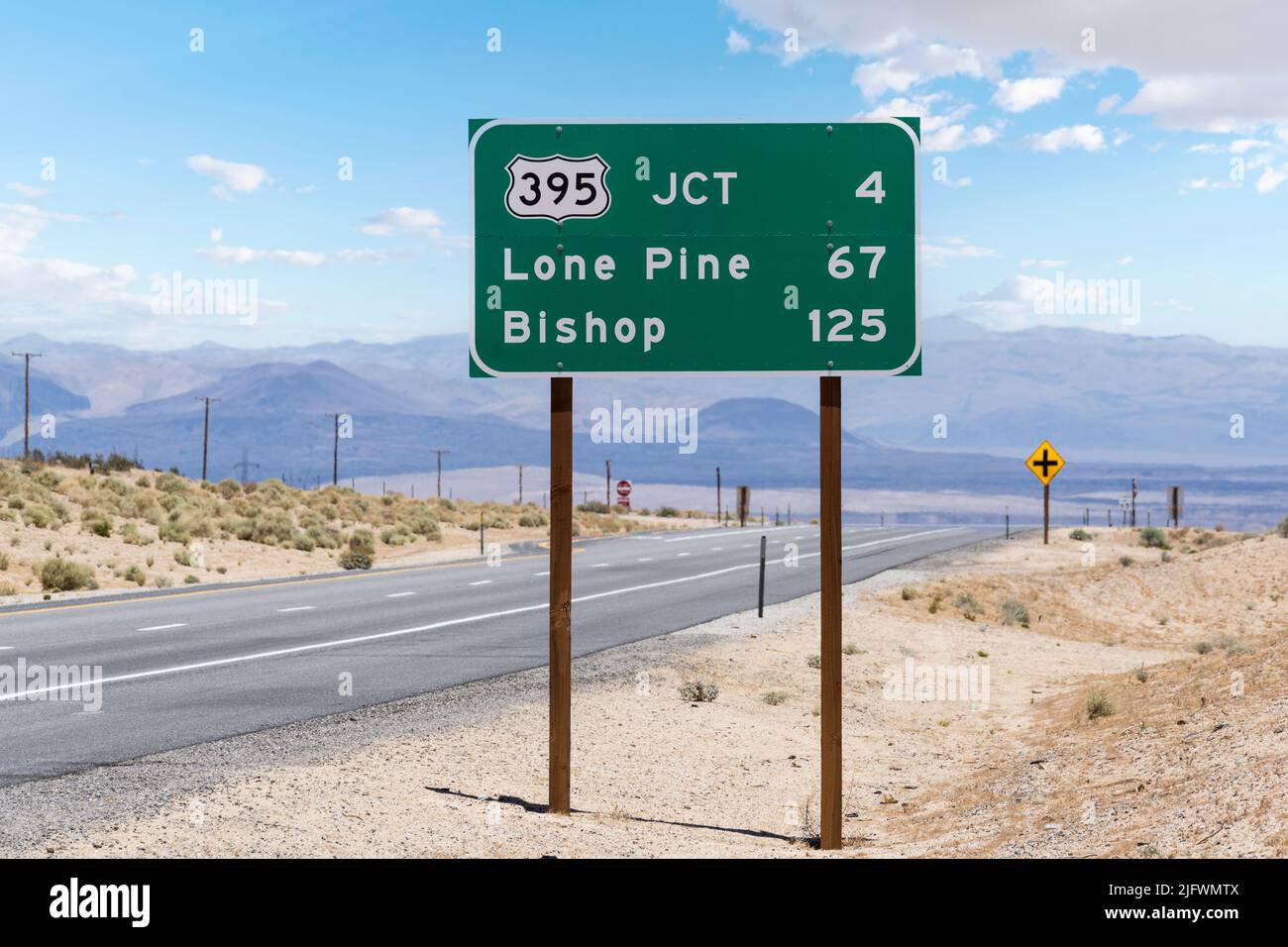 Route 395 to Lone Pine and Bishop highway sign on Route 14 near Mojave in Southern California. Stock Photo