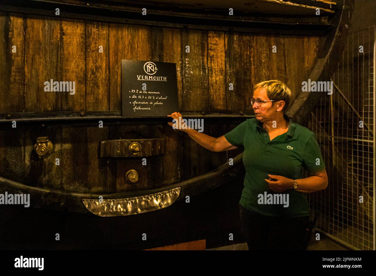 Guided tour of the Noilly Prat head office in Marseillan, France. Here, in oak barrels with a capacity of 30,000 to 40,000 liters for 12 months each, Chai des MIstelles, grape must with alcohol from sugar beets spritted and fixed at 14% to 22% alcohol. This sweet reserve from the muscatel grape is an ingredient in the vermouth of Noilly Prat Stock Photo