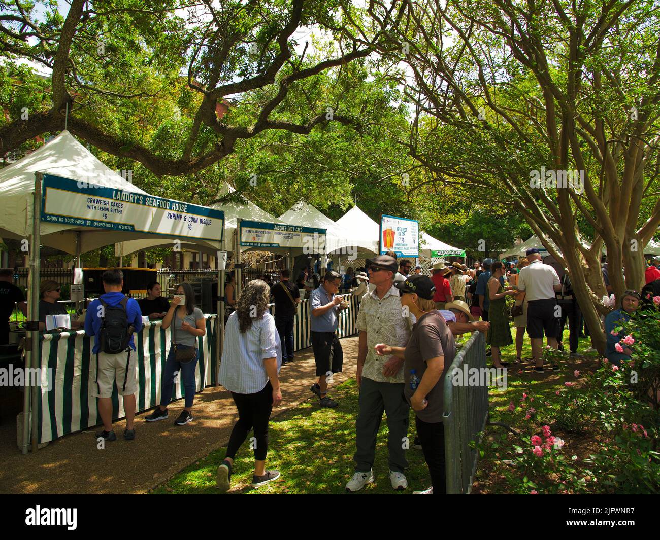 A crowd by the food vendors in Jackson Square during French Quarter