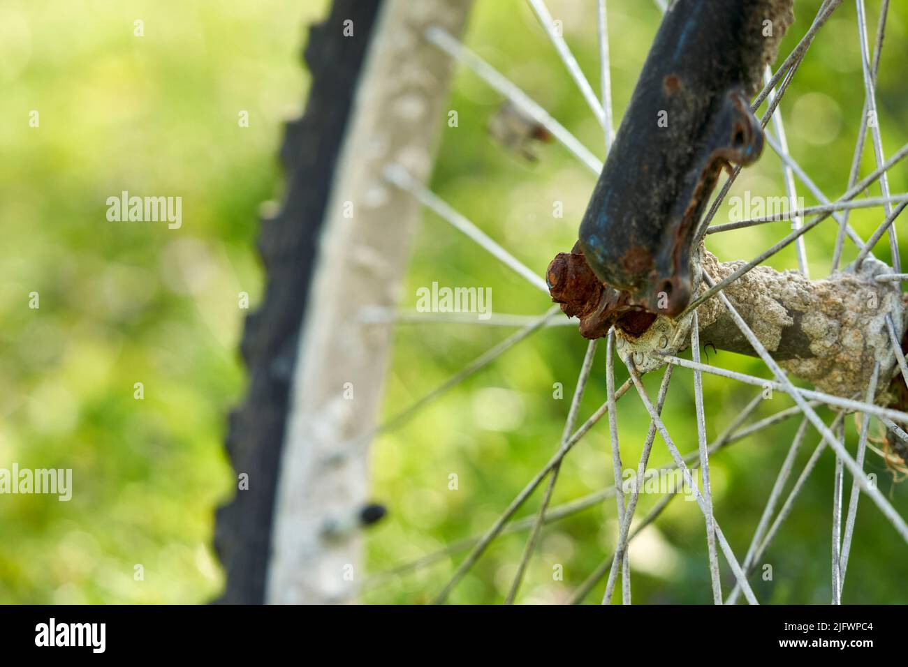 Close up of an old rusty bicycle wheel. MTB Two-wheeler is a sea find (Seefunde). Stock Photo