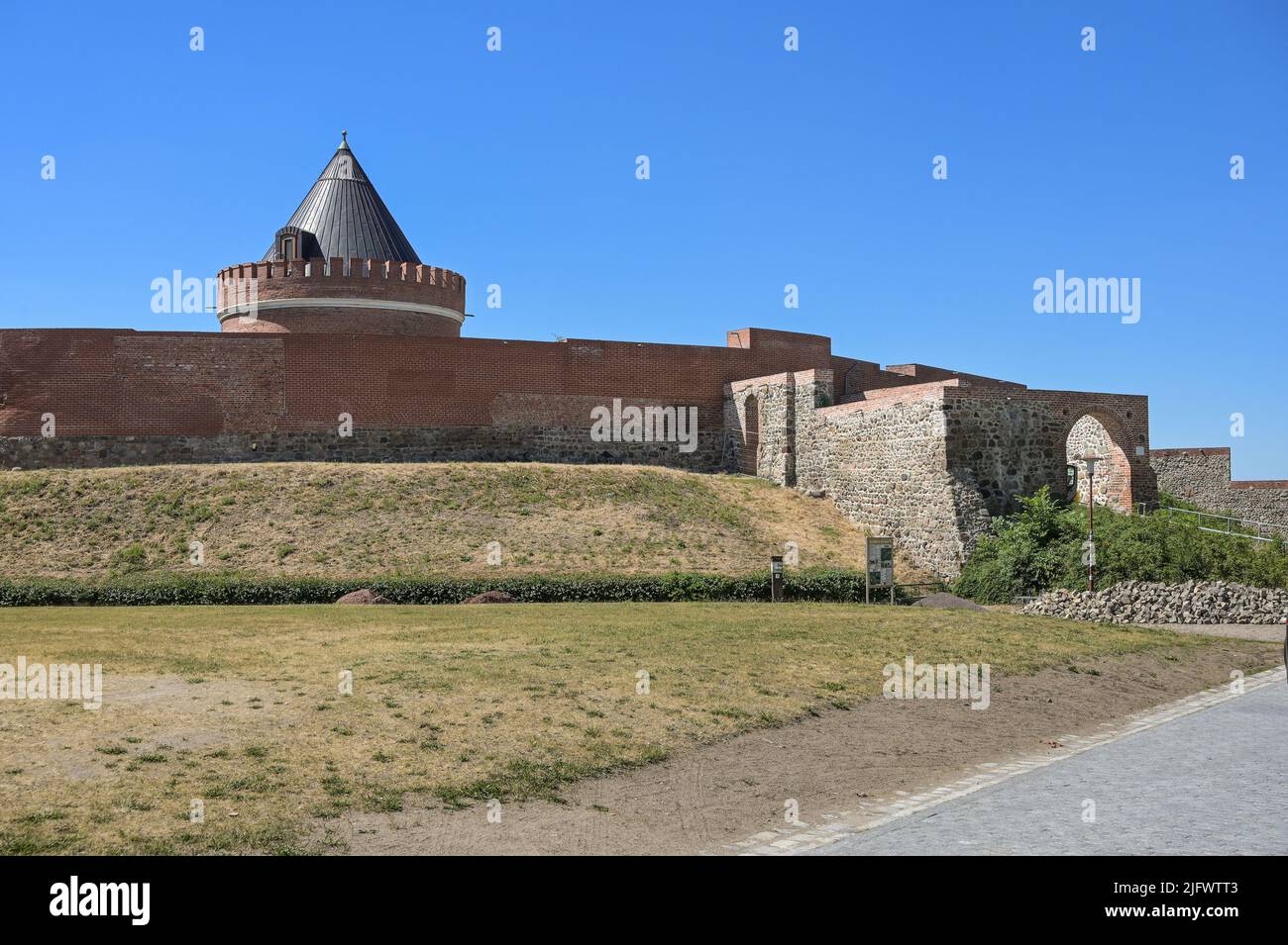 Lindau, Germany. 22nd June, 2022. Brick wall, keep and gate complex of Lindau Castle. The castle was built in the 9th-10th century. Credit: Heiko Rebsch/dpa/Alamy Live News Stock Photo