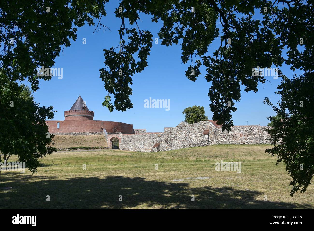 Lindau, Germany. 22nd June, 2022. View of the ruins of Lindau Castle from the ramparts. The castle was built in the 9th-10th century. Credit: Heiko Rebsch/dpa/Alamy Live News Stock Photo