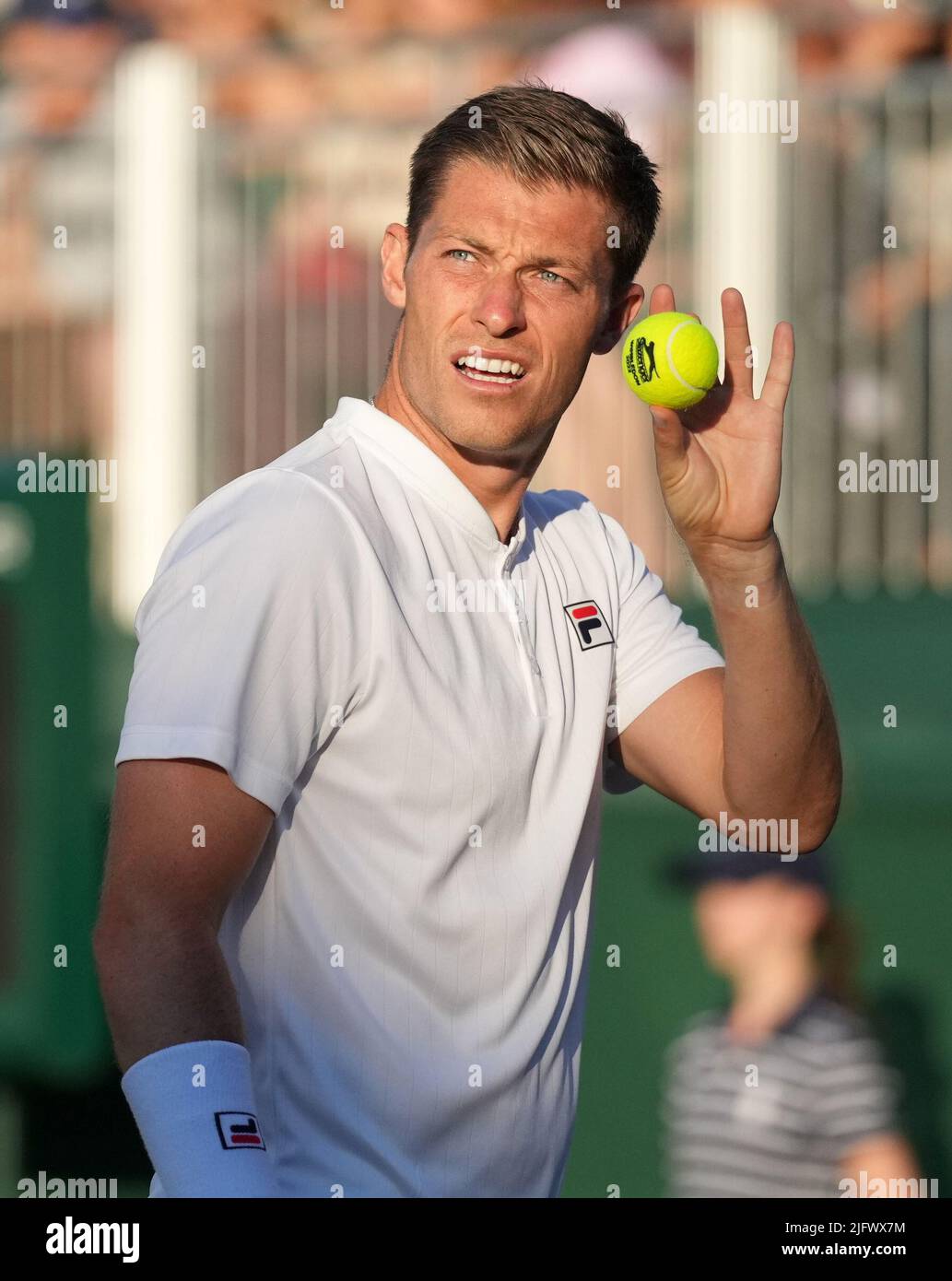 Neal Skupski during his mixed doubles match on day nine of the 2022 Wimbledon Championships at