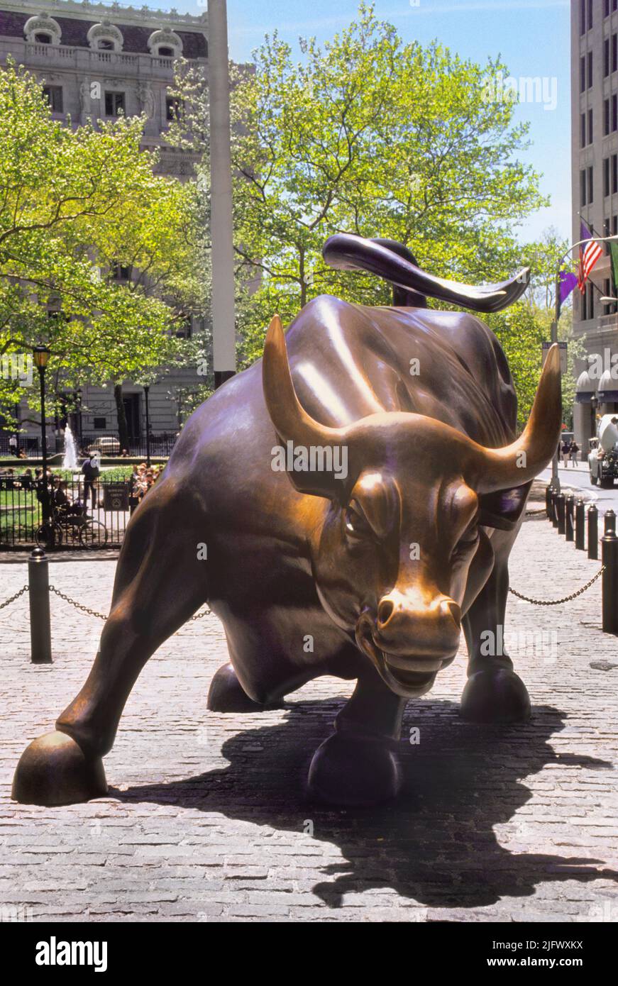 Wall Street Bull, Charging Bull or Bowling Green Bull. Bronze sculpture on Wall Street, Financial District of Lower Manhattan in New York City, USA. Stock Photo